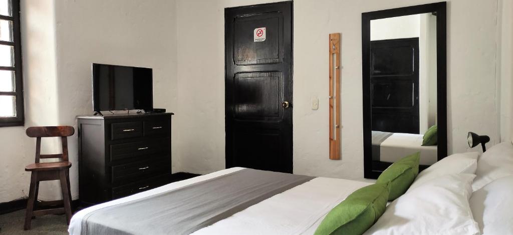 Postel nebo postele na pokoji v ubytování Hotel Premium Real