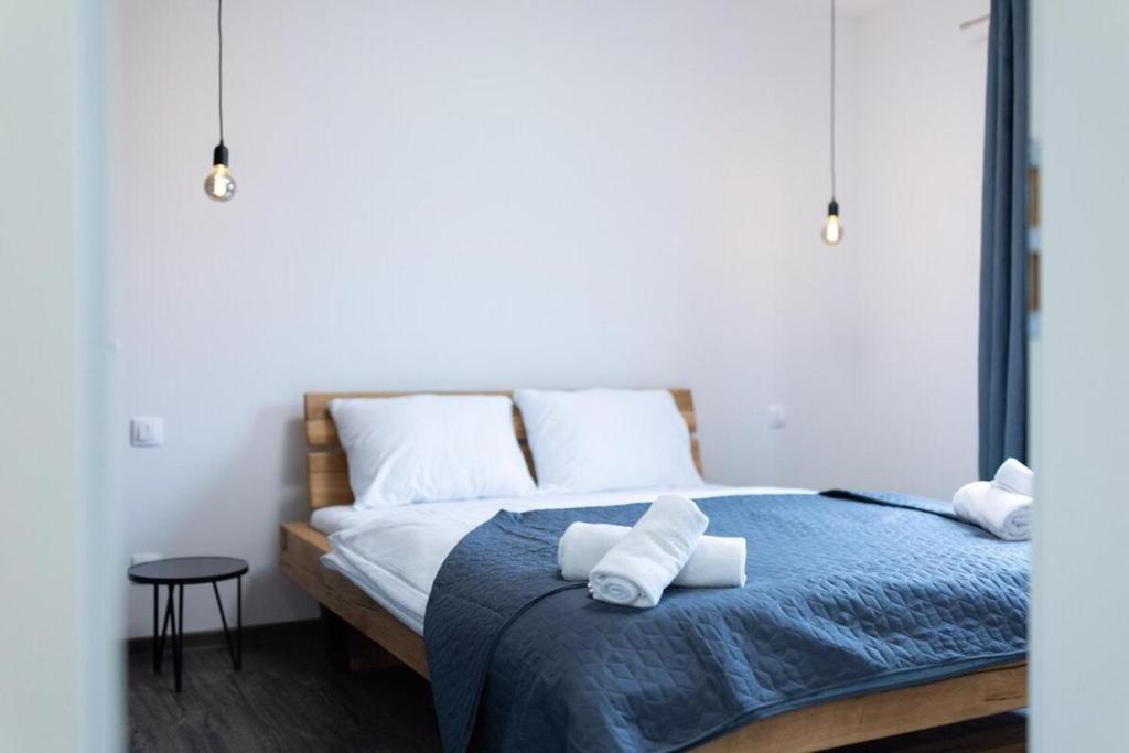 Postel nebo postele na pokoji v ubytování Apartmány u Josífka Velké Losiny