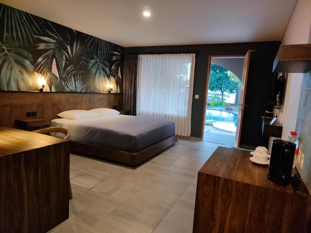 Postel nebo postele na pokoji v ubytování La Collina Villa