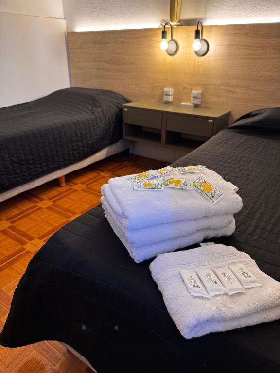 Postel nebo postele na pokoji v ubytování Chrome Hotel