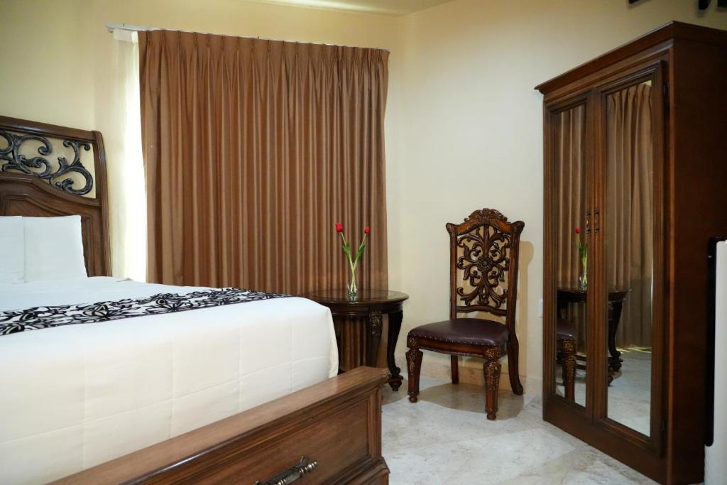 Postel nebo postele na pokoji v ubytování Hotel Real de La Peña