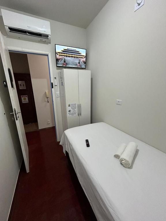 Postel nebo postele na pokoji v ubytování Pousada automática sem recepção 1