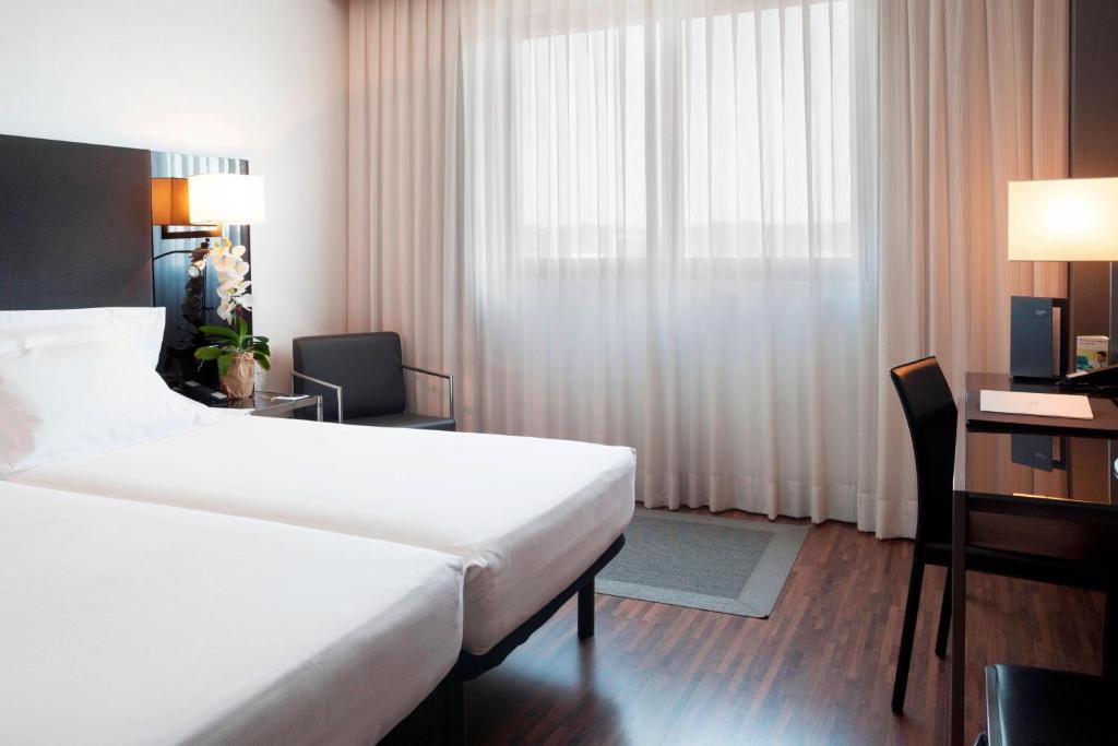 Postel nebo postele na pokoji v ubytování AC Hotel Padova by Marriott