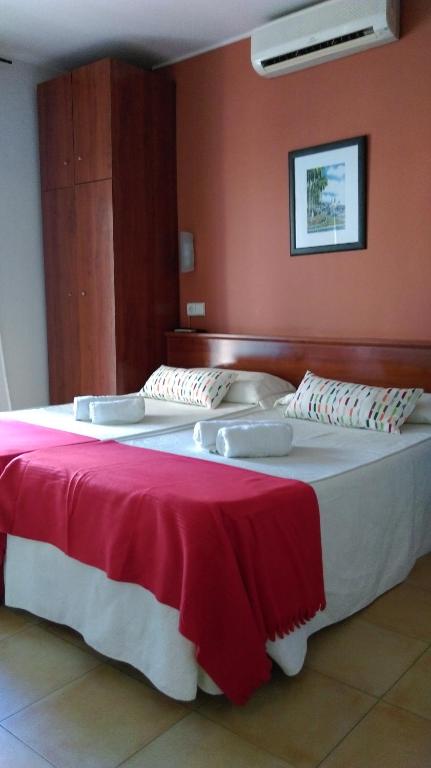 Postel nebo postele na pokoji v ubytování Hostal Termes