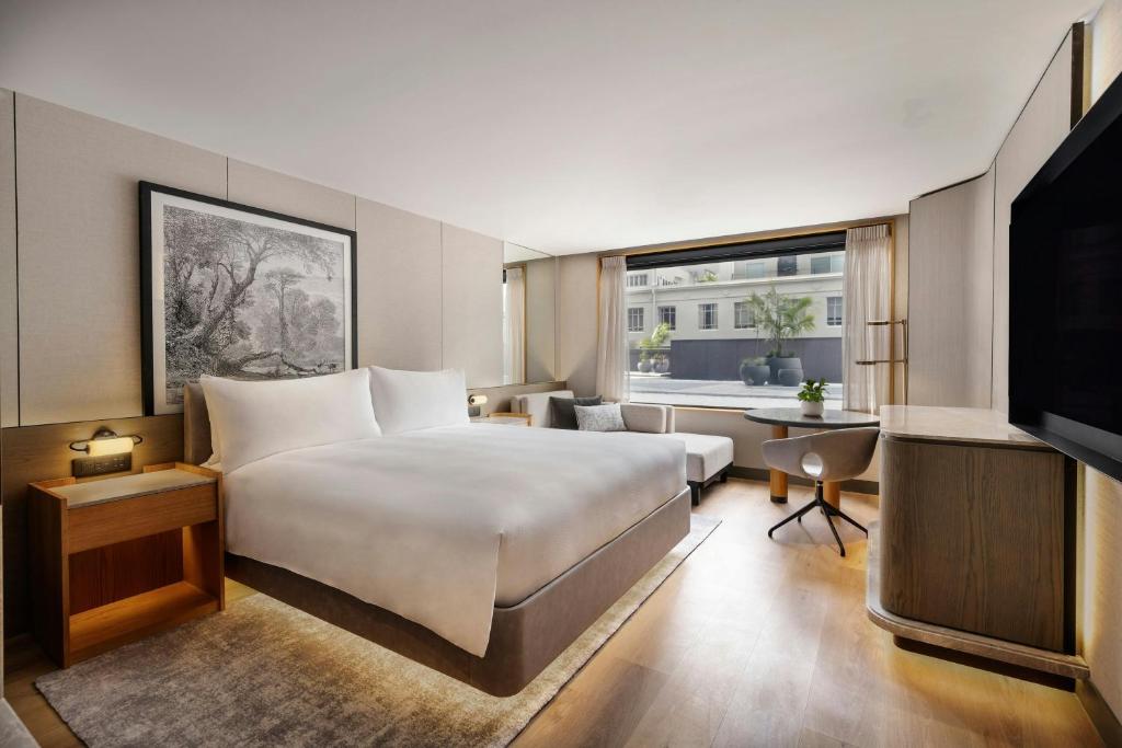 Postel nebo postele na pokoji v ubytování JW Marriott Auckland
