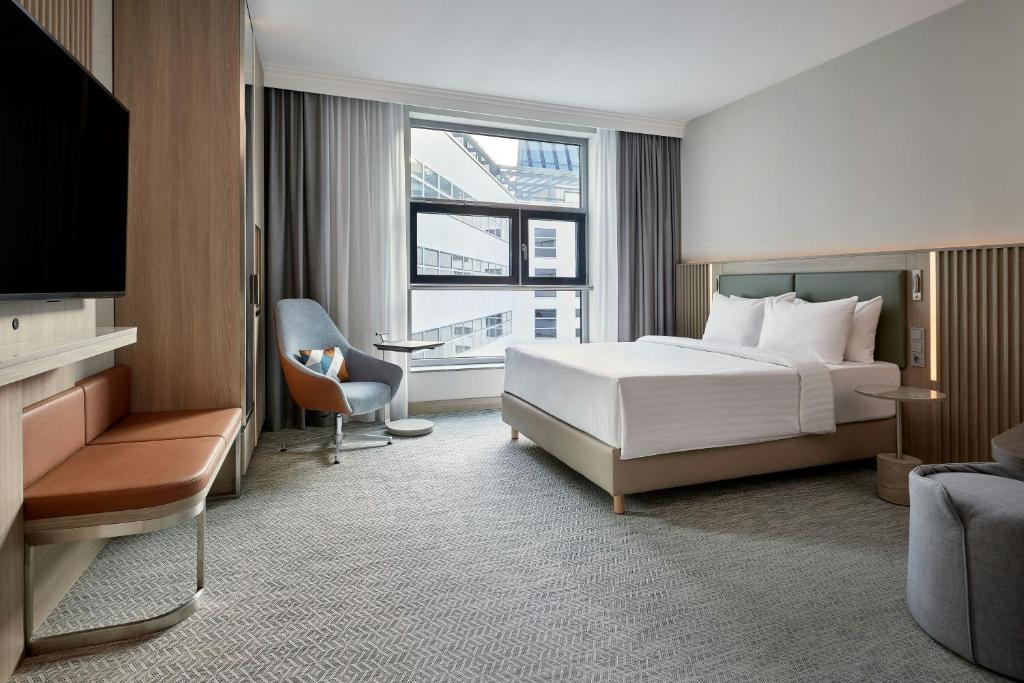 Courtyard by Marriott Berlin City Centerにあるベッド