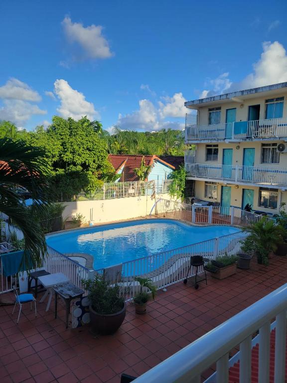 Bazén v ubytování Appartement avec piscine nebo v jeho okolí