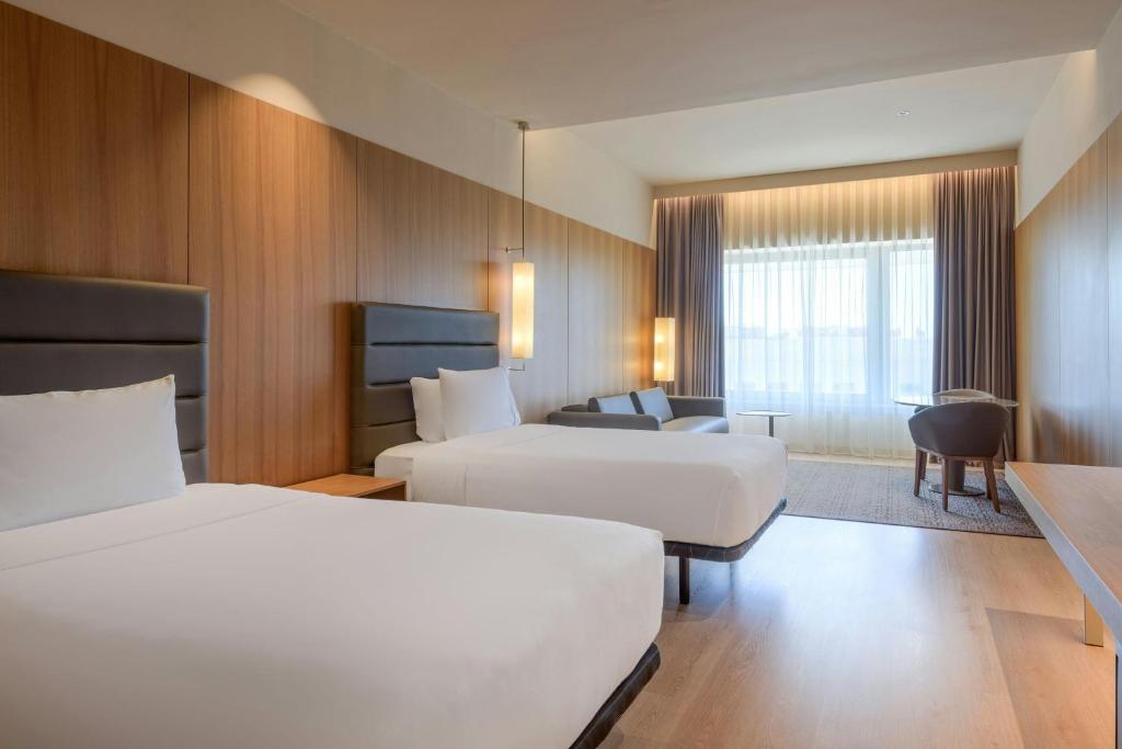 Posteľ alebo postele v izbe v ubytovaní AC Hotel Diagonal L'Illa by Marriott