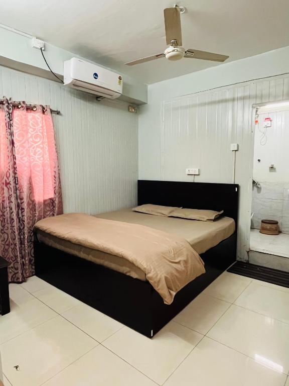 Postel nebo postele na pokoji v ubytování Homestay Ac Dormitory