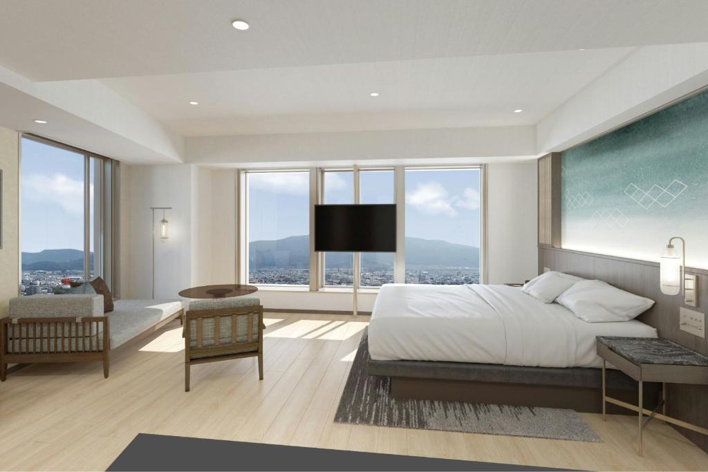 Postel nebo postele na pokoji v ubytování Courtyard by Marriott Fukui