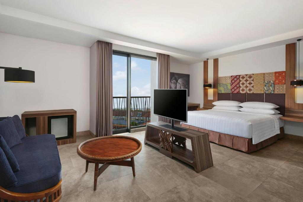 Postel nebo postele na pokoji v ubytování Fairfield by Marriott Bali South Kuta