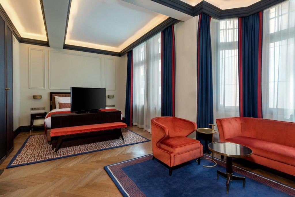 Uma área de estar em LUME Boutique Hotel, Autograph Collection