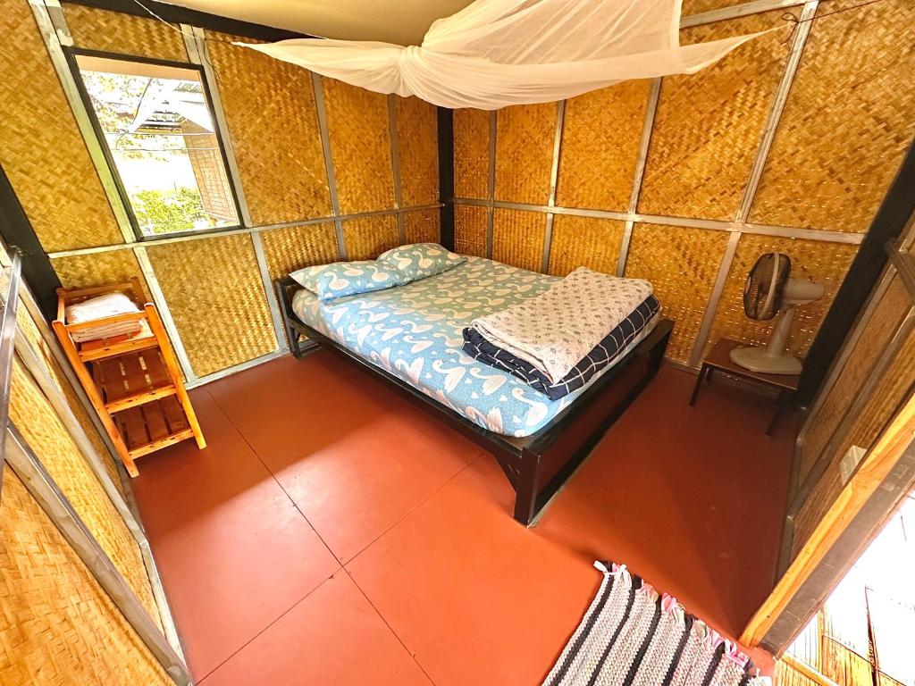 Postel nebo postele na pokoji v ubytování Twin Hut