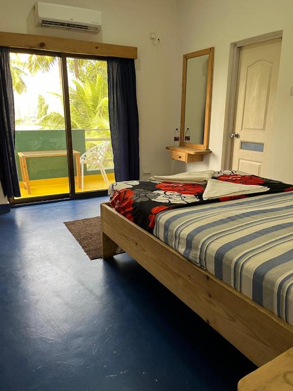 Postel nebo postele na pokoji v ubytování GREEN NEST HOSTEL, Baga- North Goa