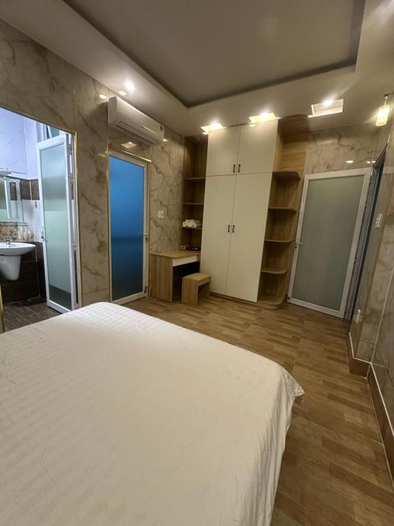 Postel nebo postele na pokoji v ubytování Vung Tau Villa mini sát biển - Gitico Homestay