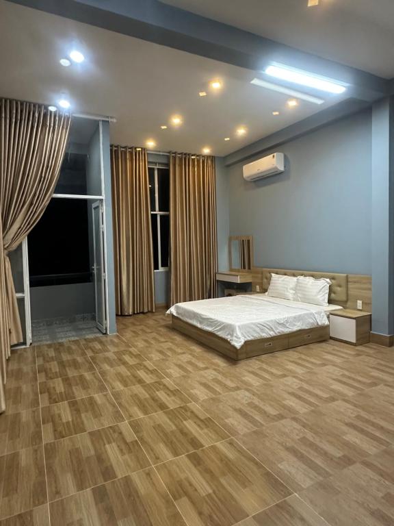Postel nebo postele na pokoji v ubytování Vung Tau Villa mini sát biển - Gitico Homestay