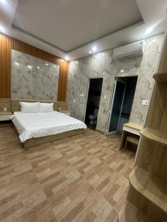Postel nebo postele na pokoji v ubytování Vung Tau Villa mini sát biển - Gitico Homestay