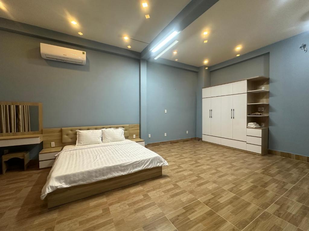 Postel nebo postele na pokoji v ubytování Vung Tau Villa mini sát biển - Gitico Homestay