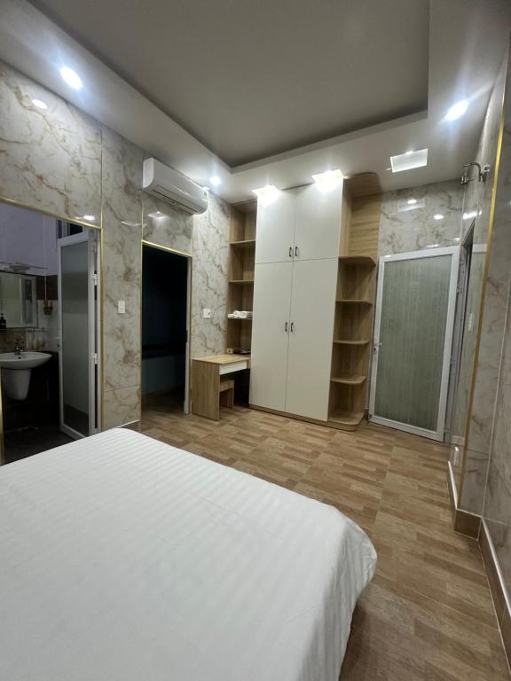 Postel nebo postele na pokoji v ubytování Vung Tau Villa mini sát biển - Gitico Homestay