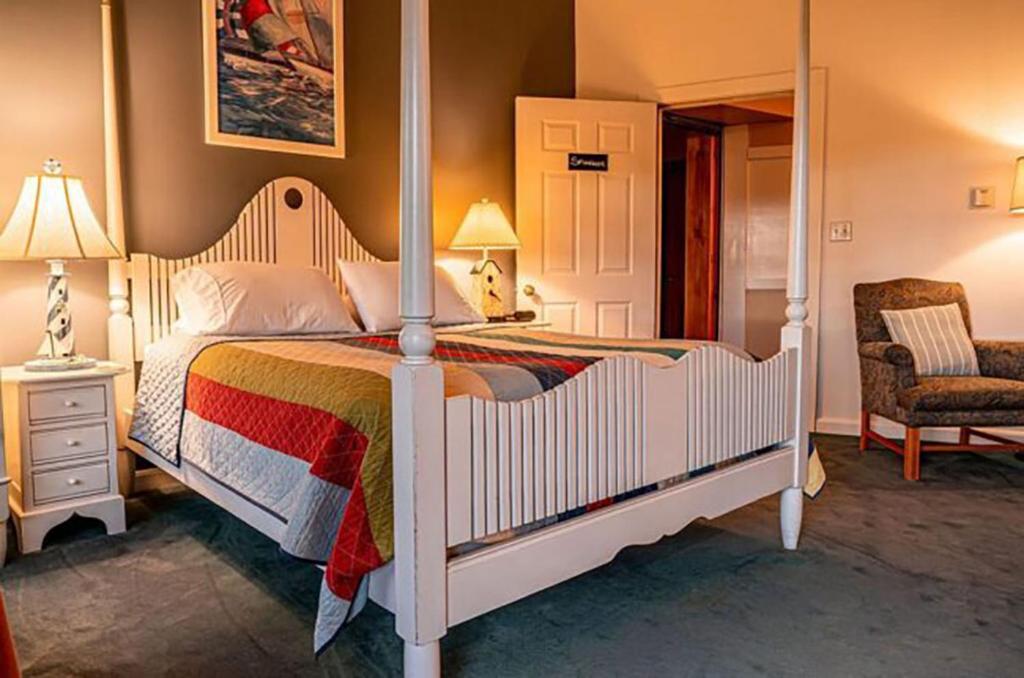 Voodi või voodid majutusasutuse Point Au Roche Lodge toas