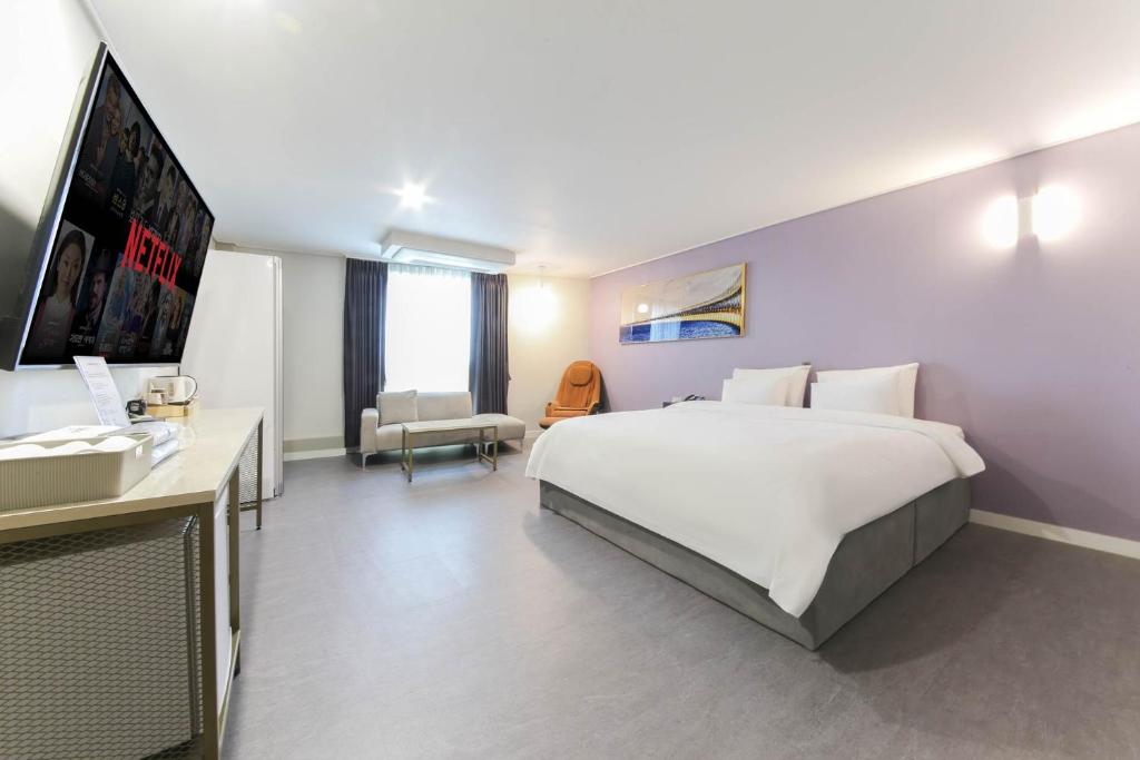 Postel nebo postele na pokoji v ubytování Brighton Hotel