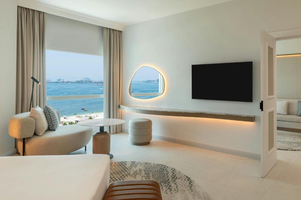 TV a/nebo společenská místnost v ubytování Sheraton Jumeirah Beach Resort