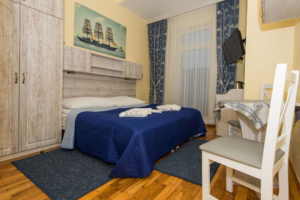 Postel nebo postele na pokoji v ubytování Villa Casteria