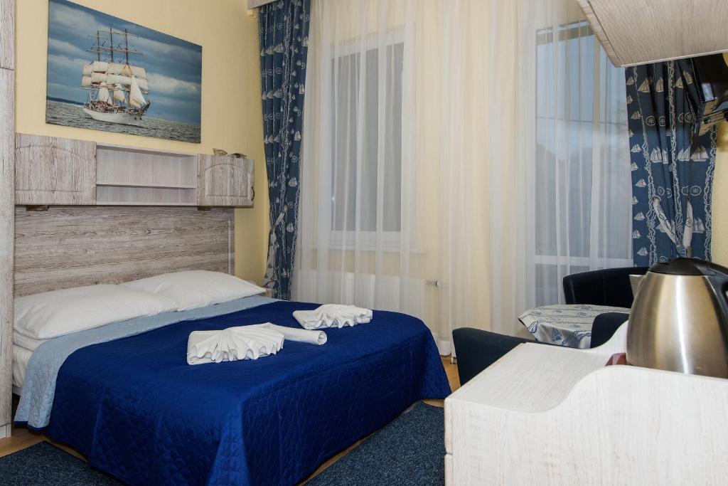 Postel nebo postele na pokoji v ubytování Villa Casteria