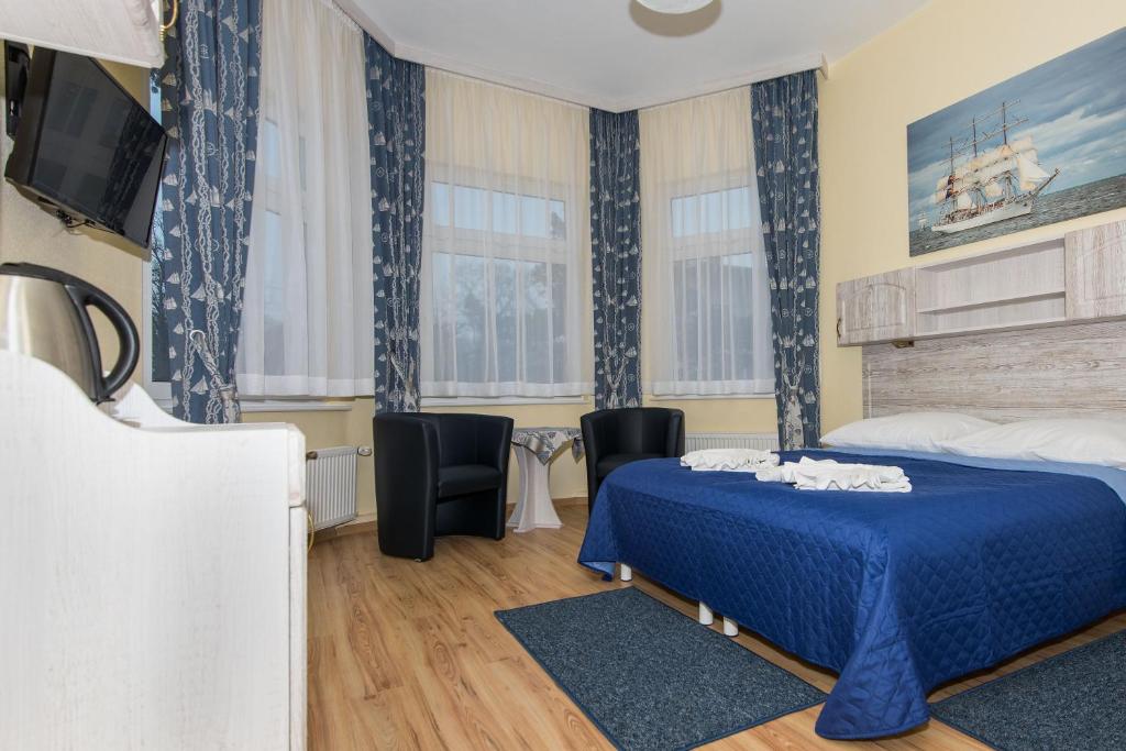 Postel nebo postele na pokoji v ubytování Villa Casteria