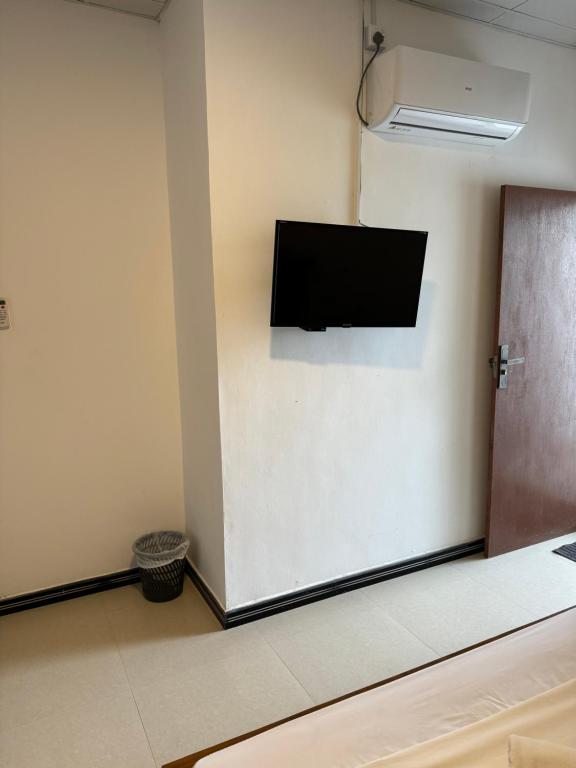 TV a/nebo společenská místnost v ubytování Sky Heaven Hotel