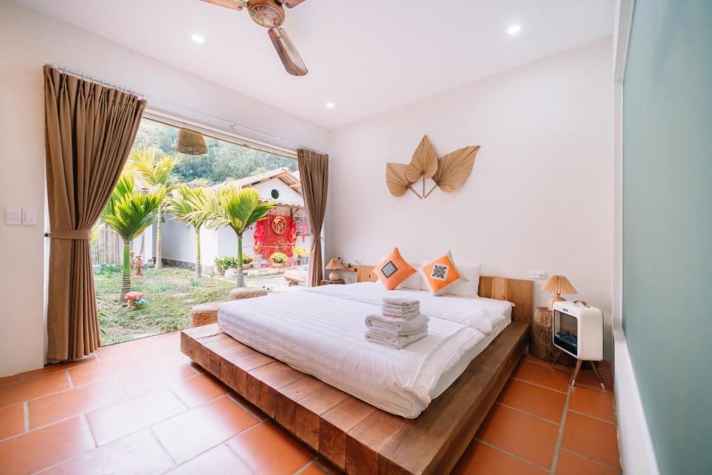 Giường trong phòng chung tại Anans Home Ha Giang - Tours &amp; Motorbike Rental