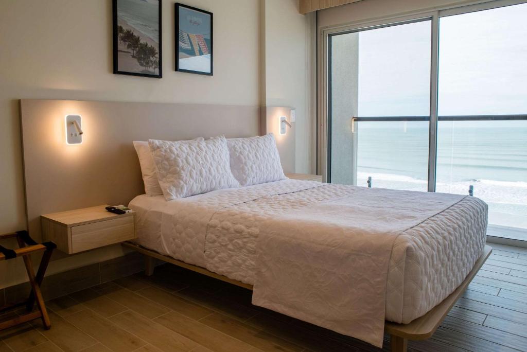 Postel nebo postele na pokoji v ubytování Radisson Riviera Panama