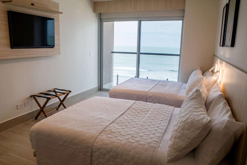 Postel nebo postele na pokoji v ubytování Radisson Riviera Panama