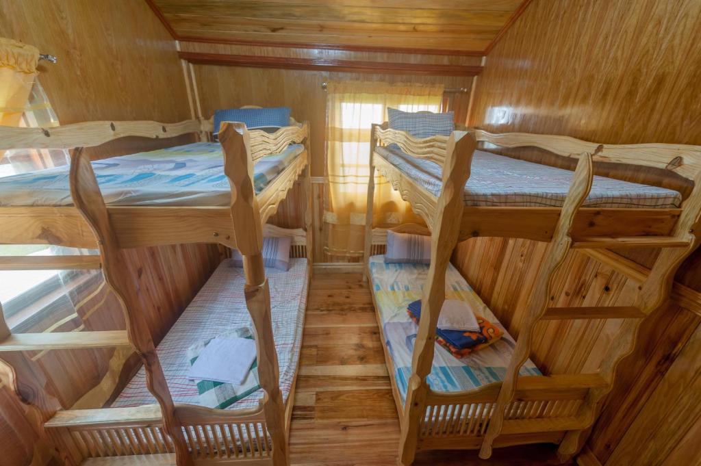 Postel nebo postele na pokoji v ubytování Rice Homestay