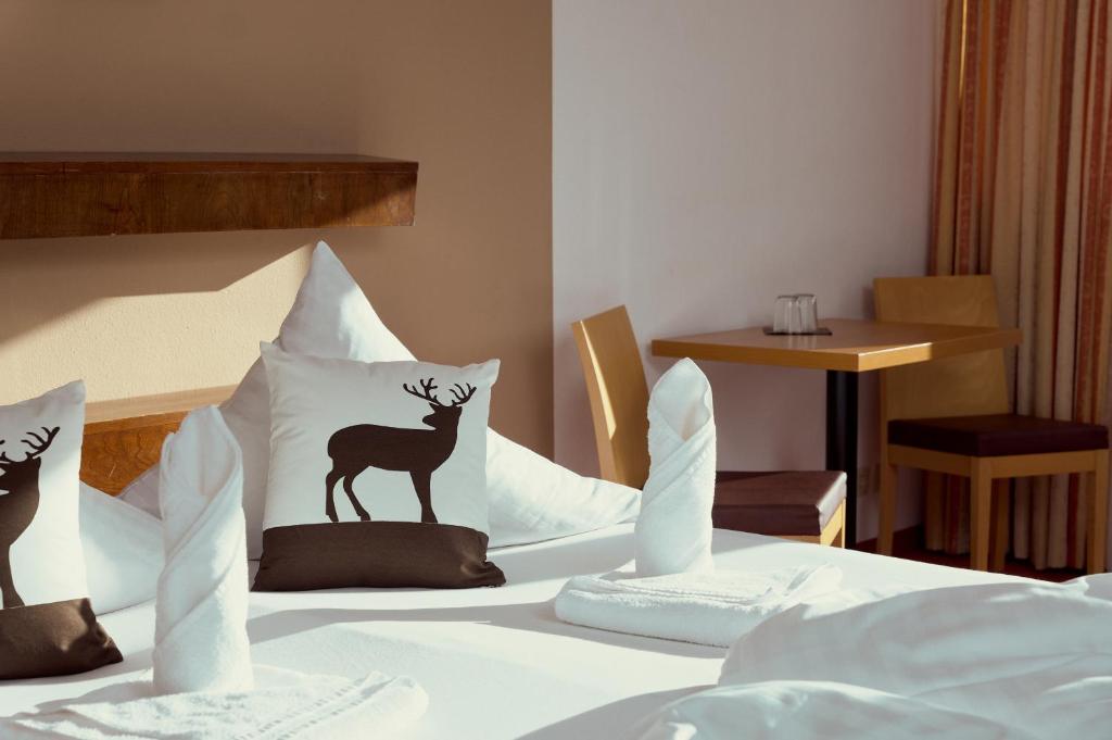 Posteľ alebo postele v izbe v ubytovaní Parkhotel Kirchberg
