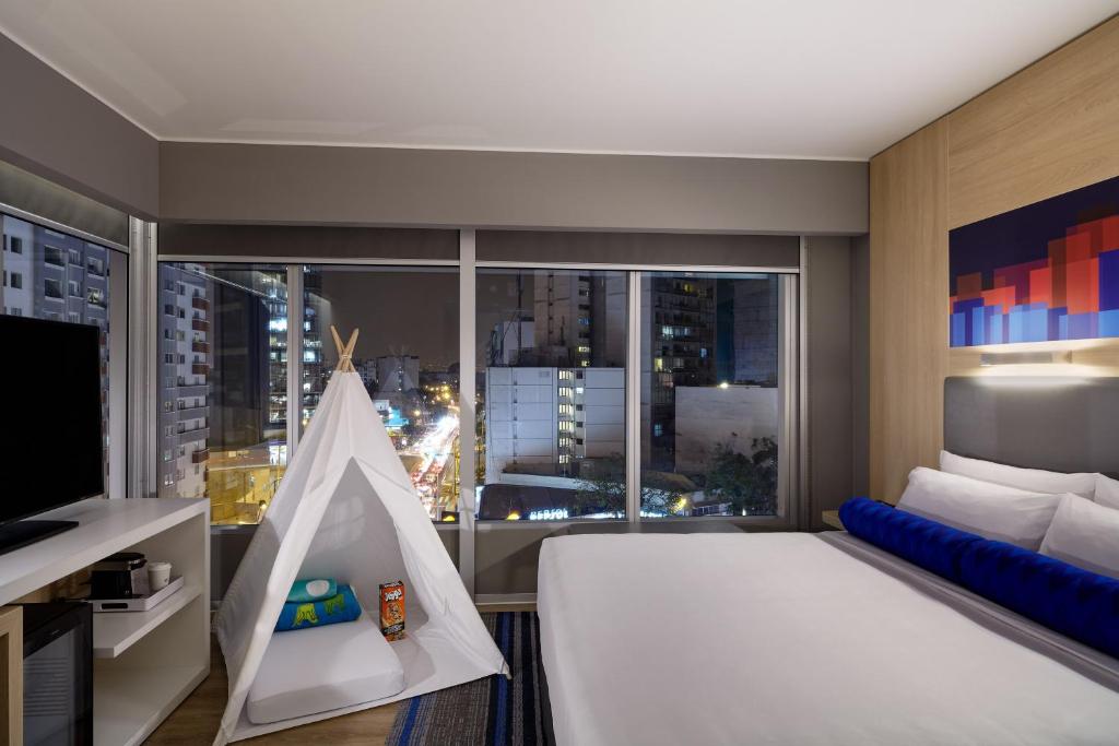 Letto o letti in una camera di Aloft Lima Miraflores