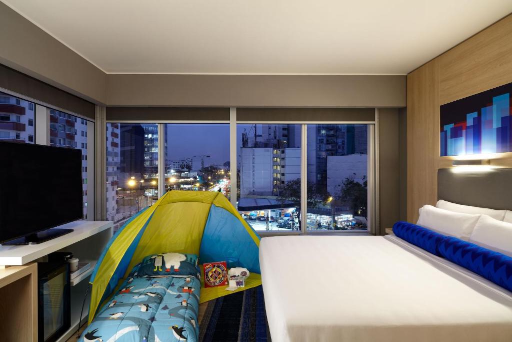 Letto o letti in una camera di Aloft Lima Miraflores
