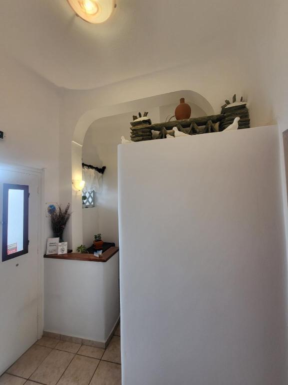 Kuchyň nebo kuchyňský kout v ubytování Aleka's Rooms