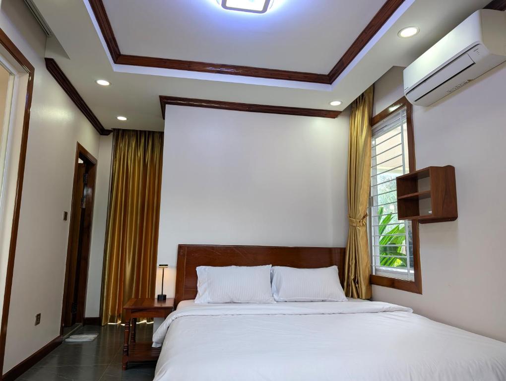 Postel nebo postele na pokoji v ubytování VILLA Siem Reap - eco & local