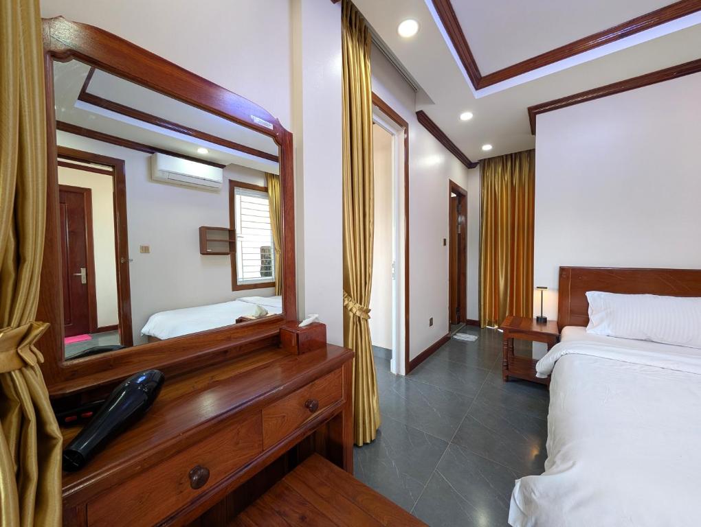 Postel nebo postele na pokoji v ubytování VILLA Siem Reap - eco & local