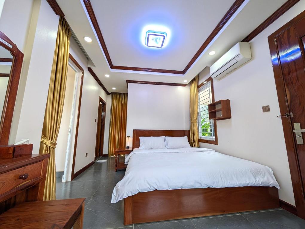 Postel nebo postele na pokoji v ubytování VILLA Siem Reap - eco & local
