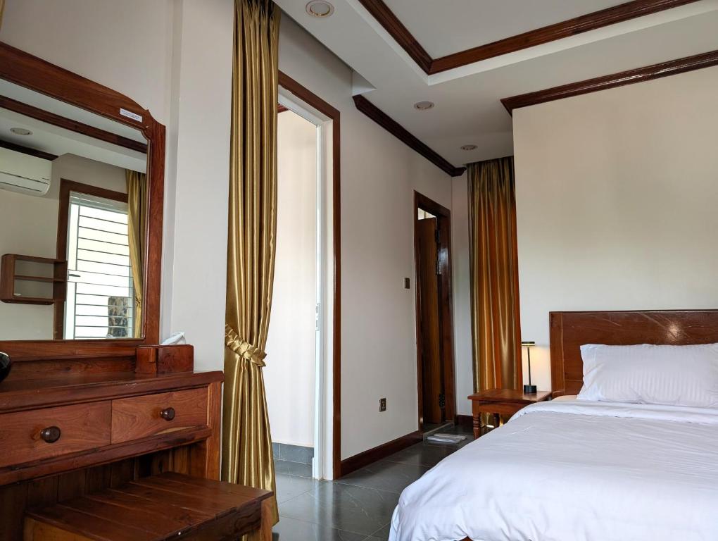 Postel nebo postele na pokoji v ubytování VILLA Siem Reap - eco & local