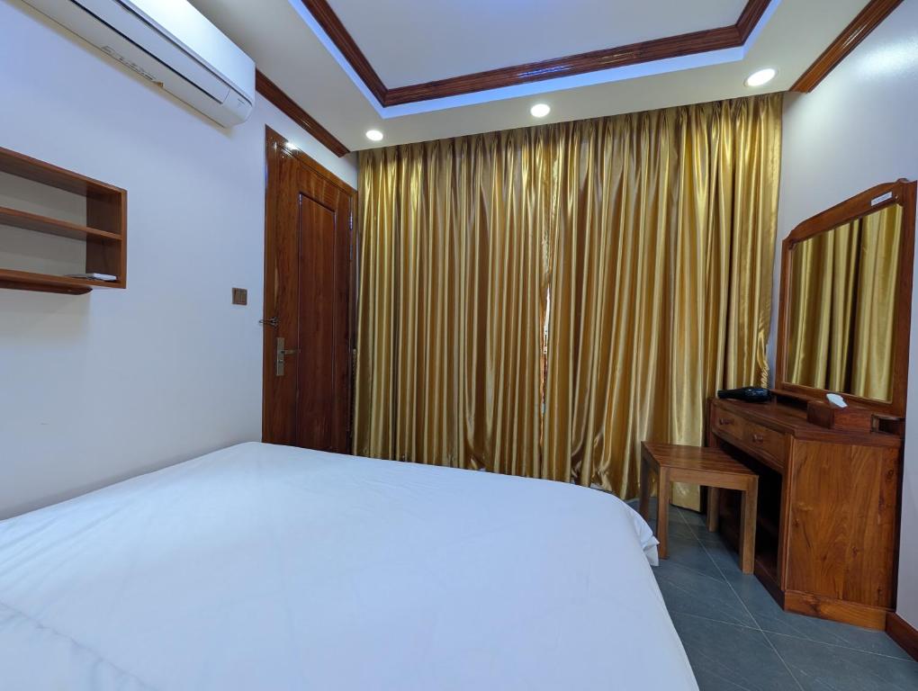Postel nebo postele na pokoji v ubytování VILLA Siem Reap - eco & local