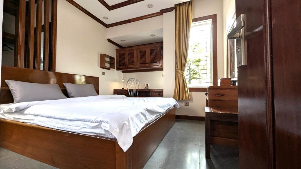 Postel nebo postele na pokoji v ubytování VILLA Siem Reap - eco & local