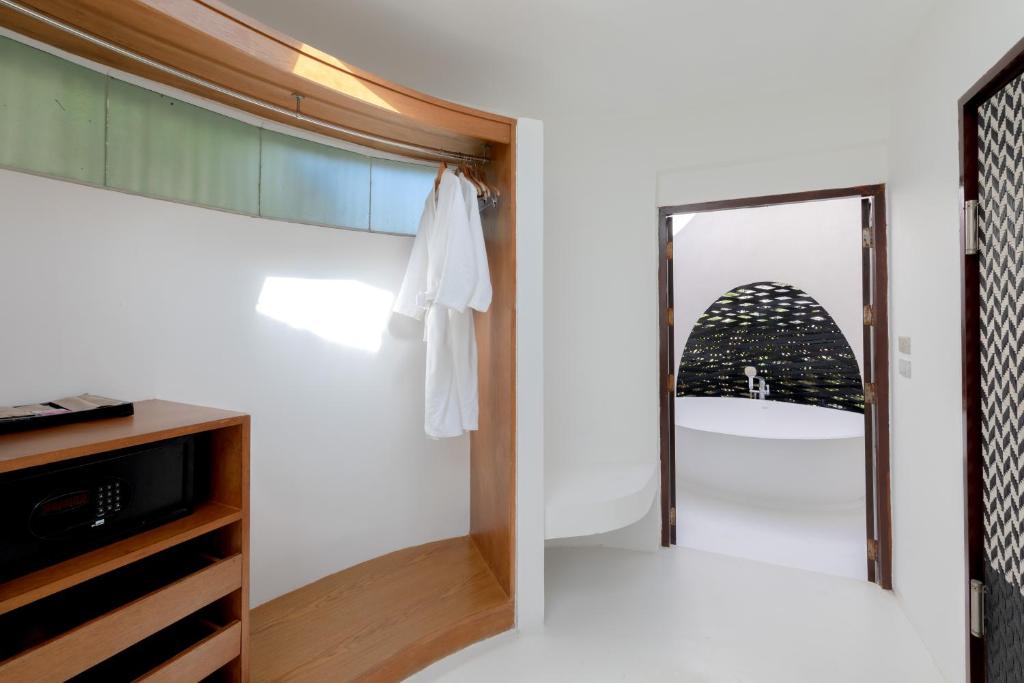 Postel nebo postele na pokoji v ubytování Ajinta Resort