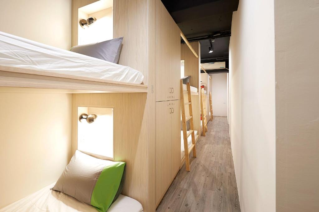 Postel nebo postele na pokoji v ubytování Ease Single Inn