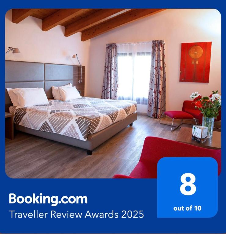 Postel nebo postele na pokoji v ubytování Hotel Del Parco