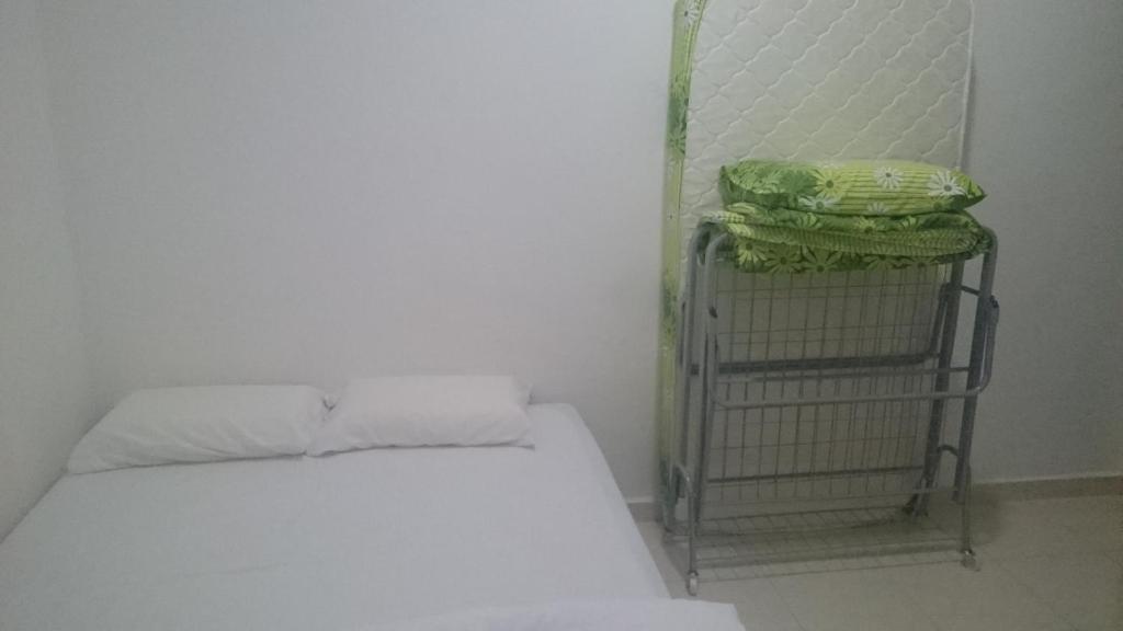 Postel nebo postele na pokoji v ubytování Axis Hotel