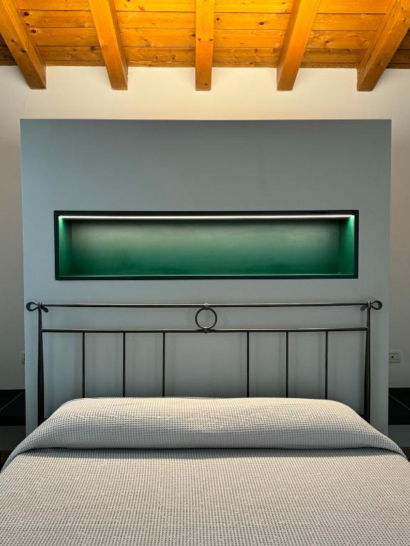 Postel nebo postele na pokoji v ubytování Agriturismo Bitturelli