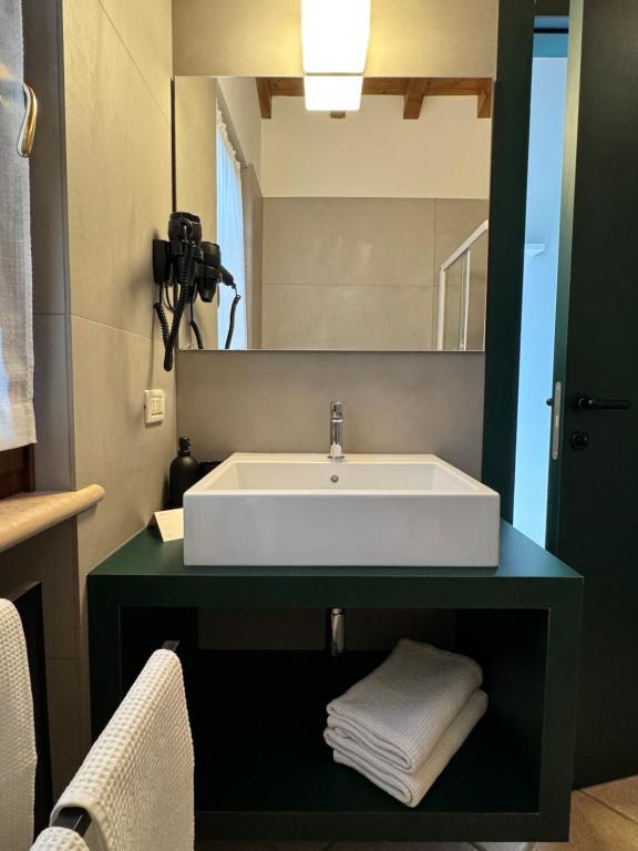 Postel nebo postele na pokoji v ubytování Agriturismo Bitturelli